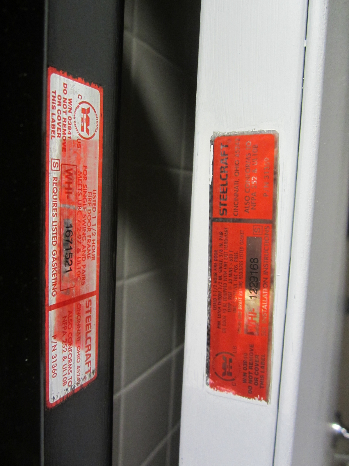 A close-up of a certified UL label for a commercial fire door inspection